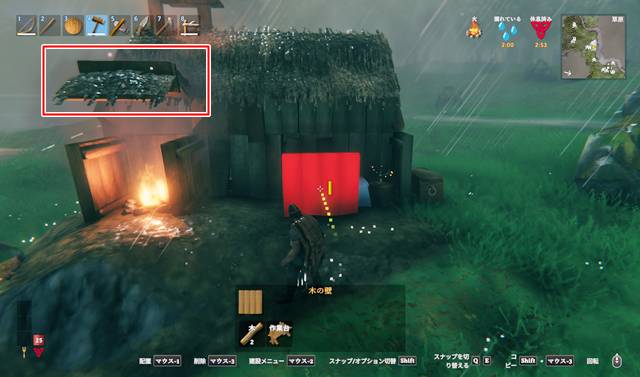 壁際に焚き火を設置