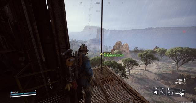 ポールに旗を掲げる