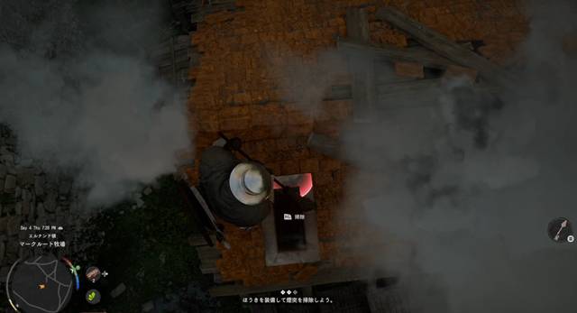 煙突の上に登って掃除する