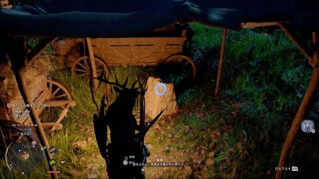 つるはしで岩を壊す